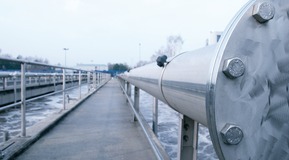 Perspective view of pipeline along waste water bassins.